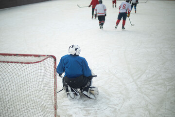 Hockey player defends goal. Goalie on ice. Playing hockey.