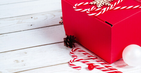 Christmas composition. Christmas gifts boxes with holiday decorations on a white background. Flat lay with copy space.