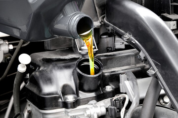 	
Refueling and pouring oil quality into the engine motor car Transmission and Maintenance Gear...