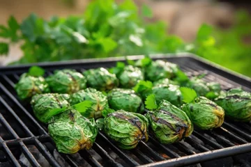 Deurstickers bbq brussels sprouts with fresh herbs on a grill © Natalia