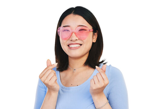 Happy asian woman, portrait and love sign, sunglasses and hand gesture for romance isolated on transparent png background. Cool face of gen z girl with smile, romantic emoji or heart icon with symbol - Powered by Adobe