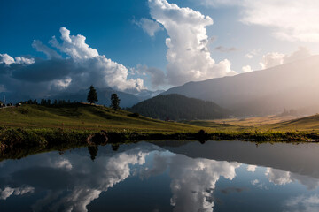 majestic view of Gulmarg, Kashmir, India at sunset. The meadow only be seen on the summer during...