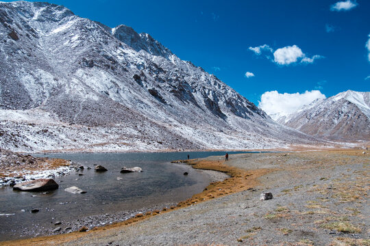 Ice lake in the side of the road before changla Pass in Ladakh, India.