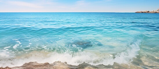 Stunning Mediterranean waters gently touching the beach