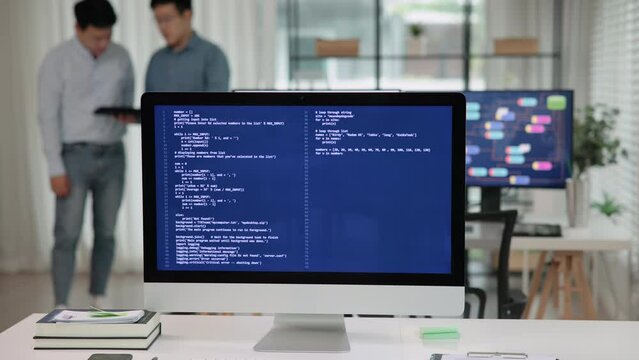 Smart AI cyber bot deep tech tools help write prompt code screen. Asia people asian man IT team typing busy talking work on predict big data center office reskill upskill STEM expert skill job course.