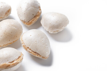 Traditional sweet almonds for Christmas isolated on white background. Copy space