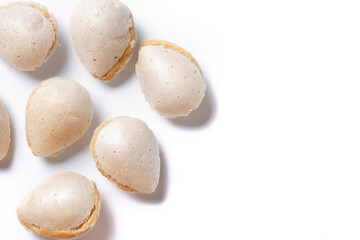 Traditional sweet almonds for Christmas isolated on white background. Copy space