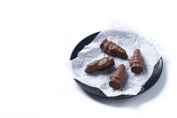 cheerful wrapped chocolate Santa Claus isolated on white background. Copy space