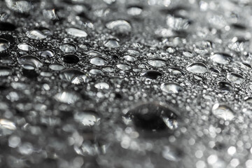 Water drops on white background texture. backdrop glass covered with drops of water. bubbles in water