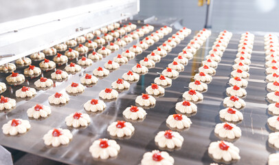 Food cookies industry banner, biscuit production in modern factory on conveyor belt