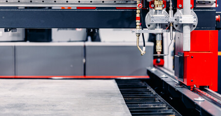 Blue color Laser CNC cut of metal with light spark