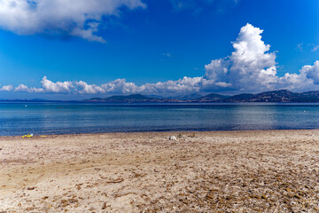 Fototapeta na wymiar Scenic landscape with Mediterranean Sea and sandy beach of peninsula of Giens on a sunny spring day. Photo taken June 10th, 2023, Giens, France.