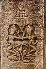 Dancing apsaras bas relief, Bayon temple , Siem Reap, Cambodia. UNESCO World Heritage Site. Capital city of the Khmer empire built at the end of the 12th century