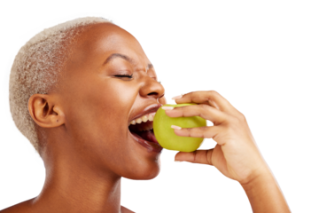 Woman, eating and apple for health, nutrition or wellness in organic diet. African person, eyes closed and fruit in mouth on isolated or transparent png background for wellbeing, vitamin or fibre