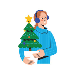 headphones holding Christmas tree. Young happy girl standing, holding Xmas fir, surprising new year, preparing for winter holidays