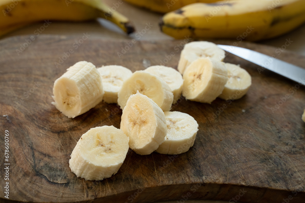 Wall mural Sliced banana on the table at the kitchen