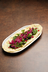 Red cabbage salad with pomegranate and parsley