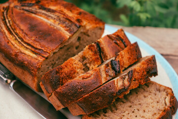 Appetizing banana bread baked close-up 