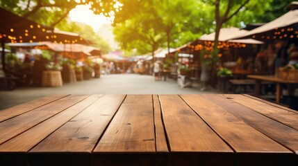 Wooden table with a background of a bustling street market 