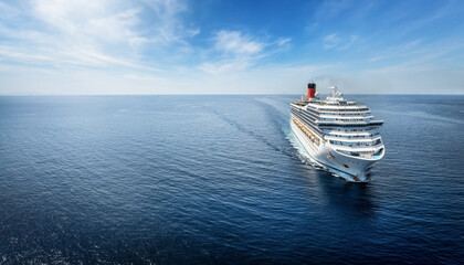 Aerial view of a generic cruise ship traveling over calm ocean with copy space as a concept for...