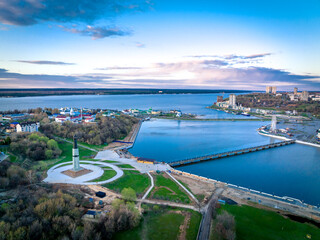 Scenic general aerial view of Cheboksary cityscape on banks of Volga River, Chuvashia, Russia