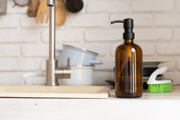 Recycled plastic pump bottle for mockup on white brick wall background near sink