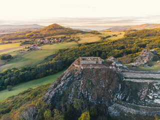 Kalich (Kelchberg in German) is a castle ruin above the village of Trebusin. The castle was founded by the Hussite governor Jan Zizka in 1421.