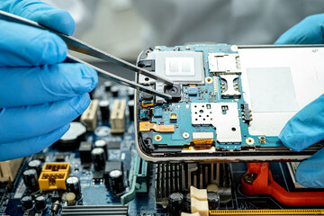 Repairing and upgrade mobile phone, electronic, computer hardware and technology concept.