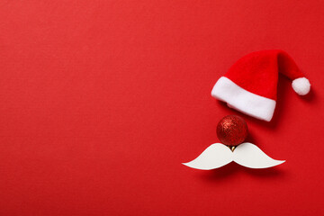 Red cap of Santa Claus with a white mustache