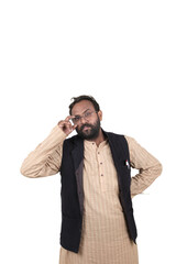 Male Indian teacher giving expression in class room.