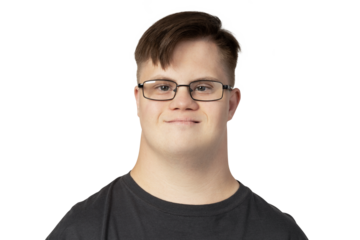 PNG, a boy with down syndrome in a black t-shirt posing for the camera, isolated on a white background