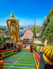 Batu Caves in Kuala Lumpur, golden statue of god Murugan