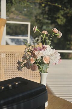 flower vase with beautiful flowers. artificial flowers. decoration interior 