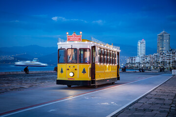 Nostalgic tram running in Izmir City Kordon Caddesi. Konak, izmir. Turkey - obrazy, fototapety, plakaty