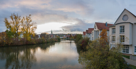 View over the river Neckar at Rottenburg am Neckar, Baden-Wuerttemberg, Germany, during sunset, autumn, panoramic