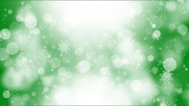 Green christmas winter background with snowflakes and round blurred bokeh. New Year greeting screensaver. Looped animation.