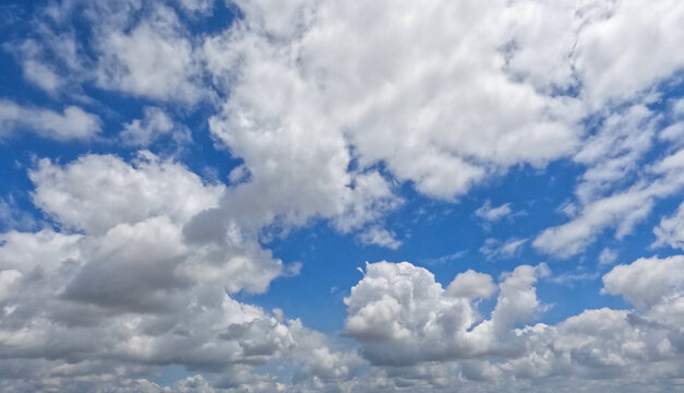 blue sky with clouds. blue sky and clouds. clouds in the sky. white clouds in the blue sky.