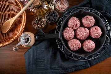 Fresh raw pork meatballs with spices - obrazy, fototapety, plakaty