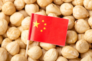 Flag of China on hazelnuts. Agrobusiness of growing hazelnuts in China concept