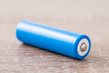18650 lithium-ion battery, close up. High capacity battery on the table