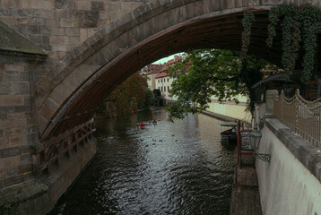 Water canal in Prague under the Karl Bridge. - obrazy, fototapety, plakaty
