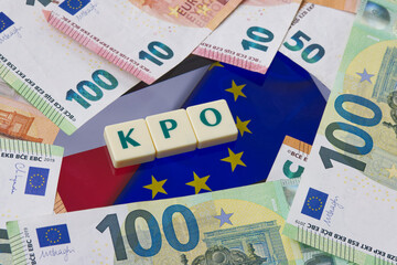 Inscription KPO which is Krajowy Plan Odbudowy next to Euro Money. and EU and Polish Flag Concept showing EU program for Poland.