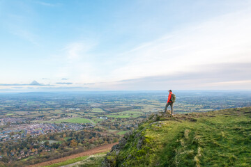 amazing view of Hiker standing of the peak the Malvern Hill of Great Malvern, Worcestershire, United Kingdom