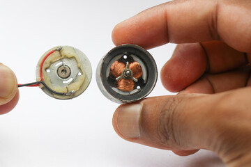 DC Motor mostly used in dvd players and drivers with its back part removed to have a view of rotor...