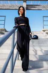 Defiant Elegance: Portrait of a Brunette in Black