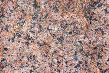 Natural red  granite stone pattern, close up background texture