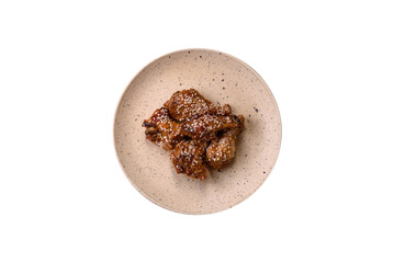 Delicious grilled chicken wings with salt, spices and teriyaki sauce