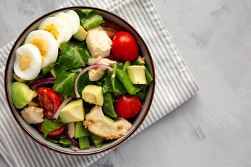 Homemade Honey Mustard Chicken Salad in a Bowl, top view. Copy space.