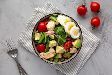 Homemade Honey Mustard Chicken Salad in a Bowl, top view. Flat lay, overhead, from above.