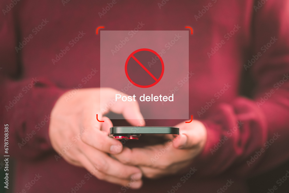 Poster young man using a mobile phone to play social media on a website, but the post has been deleted. sea